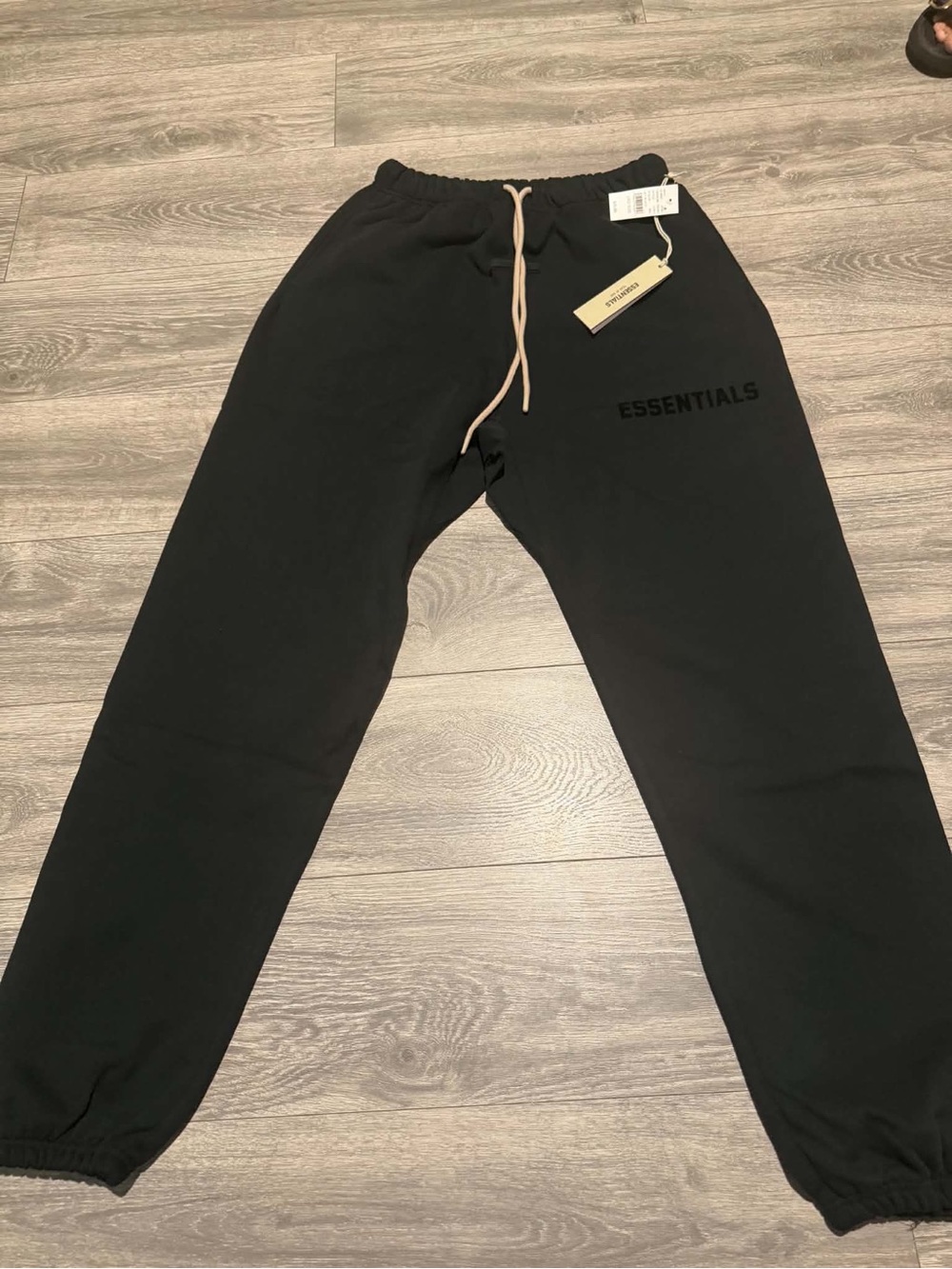 Fear of God ESSENTIALS Black Sweatpants with Tan Drawstring